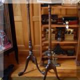 F32. pair of tripod candlestands.